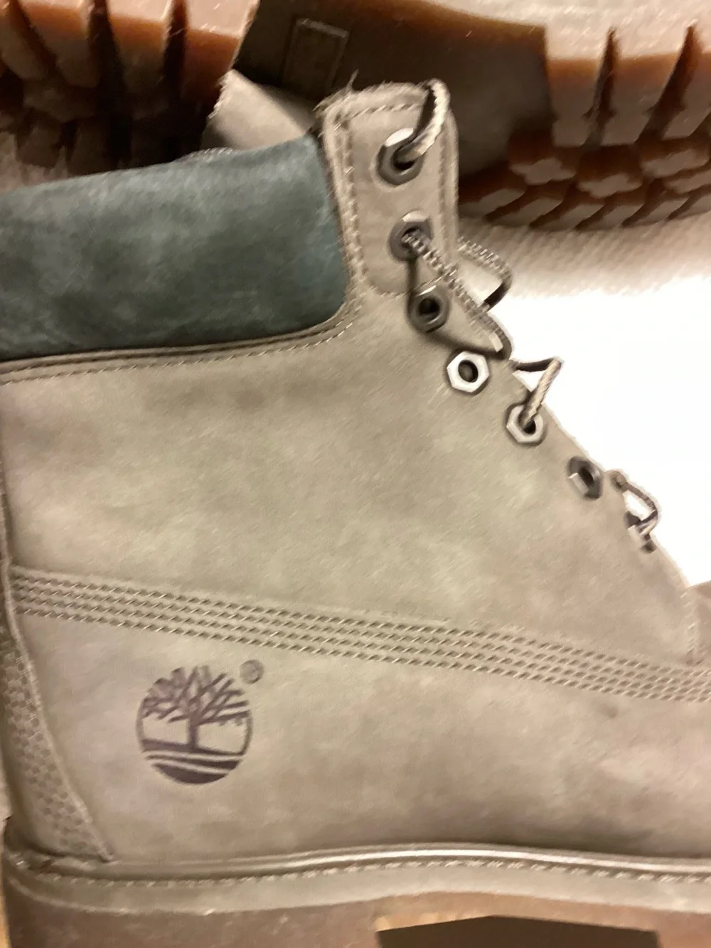 Timberland boots Grey size 9.5 shows marks wear tear bottoms barely used